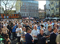 Manchester City supporters gathered on Hamburg's Reeperbahn, enjoying the spring sunshine