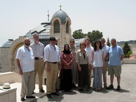 Daily Service contributors standing in front of sunlit church domes.  Left to right: Rabbi Dr Alan Unterman, Philip Billson, Dr Ed Kessler, Dr Musharraf Hussain, Anjum Anwar, Becky Harris, Christine Morgan, Canon Chris Chivers, Charlotte Kirby, Ernie Rea and Phil Booth