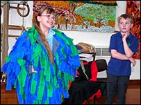 Trying on a morris dancer's rag jacket
