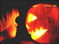 Pumpkin Halloween lantern and child