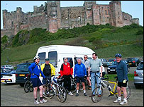 People standing in front of Edinburgh Castle 