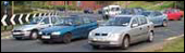 Cars on a roundabout
