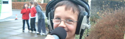 Boy with mic and headphones