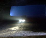 Alice Roberts and Mine Surveyor, Jason Hopps, making their way down into the mine