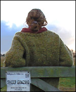 Agnes Kiemel watches her dog Gill at work