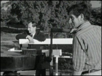 Michael Canney with bridge keeper on swing bridge