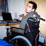 Ciaran at his desk in his room