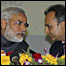 अनिल अंबानी और नरेंद्र मोदी