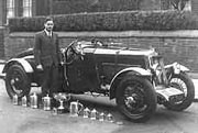 Tom Delaney with his beloved Lea Francis and some of his trophies