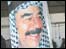 Palestinos carregam cartaz com a imagem de Saddam Hussein