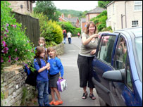 Members of the Lovell family with their car