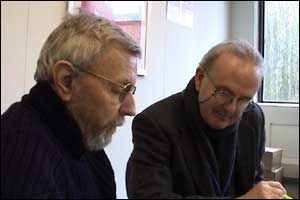 Patrick O'Mahoney on the left, catching up on his reading.