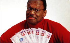 Alvin Hall looking after the cash 