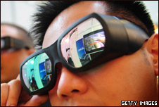 a man wearing 3D glasses