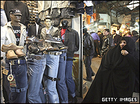 زنی از مقابل مغازه لباس فروشی عبور می کند