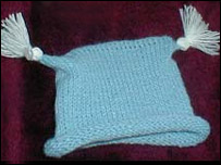 Machine Knit Hat with Tassels