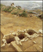 Stone-lined pits discovered in the excavations