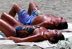 Sunbathers on a beach