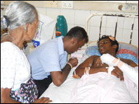 Injured trade union activist after police attack on Katunayake FTZ (file photo)