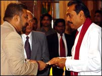 Srpathi Sooriarachchi receiving appoitment from President Rajapakse