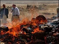 مواد مخدر در حال سوختن (عکس از AFP)