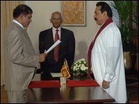 Chief Justice Asoka de Silva taking oaths before President Rajapaksa (file photo)