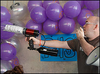 Ed Barnes firing t shirts into the crowd