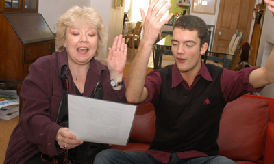 Glyn and Di practise singing