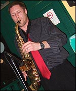 Garrick on saxophone.