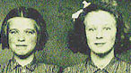 Black and white photograph of two girl evacuees