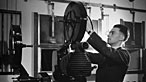 Photograph of a technician and a camera
