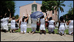 The Ladies in White Organisation, the wives and female relatives of jailed Cuban dissidents pray for their release on Havana's Fifth Avenue.  Photo by: ADALBERTO ROQUE/AFP/Getty Images