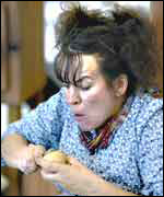 The giant's wife peels a potato