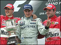 Michael Schumacher, Kimi Raikkonen e Rubens Barrichello no pódio