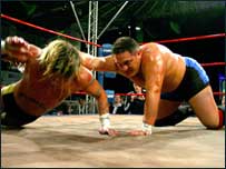 Wrestling stars in action