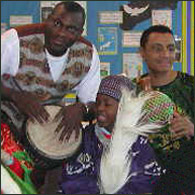Oludele Olaseinde and pupils at New Park Primary School, Kensington, Liverpool