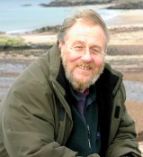 Presenter Lionel Kelleway holding seeweed