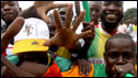 Supporters of the Malian national football team clebrate at Quatro de Fevereiro International Airport in Angola's capital Luanda