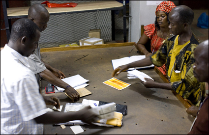 Customers bring their mail to the Monrovia post office