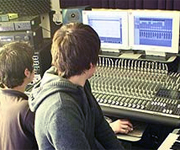 People at a mixing desk