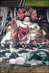 Cartaz anti-globalização com Vladimir Putin