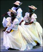 Three dancers on stage