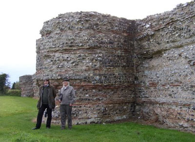 Anglo Saxon historian Dr Sam Newton and Roman specialist John Fairclough at Burgh Castle, Norfolk.