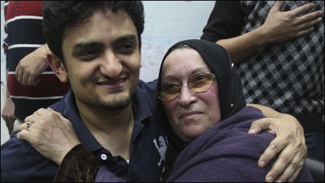 Egyptian Wael Ghonim, a Google marketing manager, hugs the mother of Khaled Said. Photo: AP Photo/Ahmed Ali