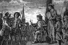 Kett sitting under the oak at Wymondham