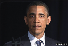 US President Barack Obama making a speech, with part of his face obscured behind a teleprompter