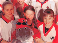 Swimmers with hippo mascot