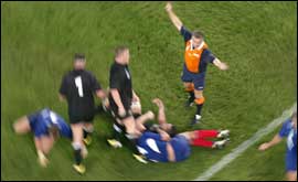 Chris White refereeing the 3rd/4th Playoff game between  France and New Zealand