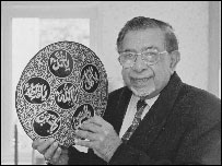 Gulam Musa with the symbol of the Shia Muslim  sect 