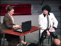 Man and woman on stage  203